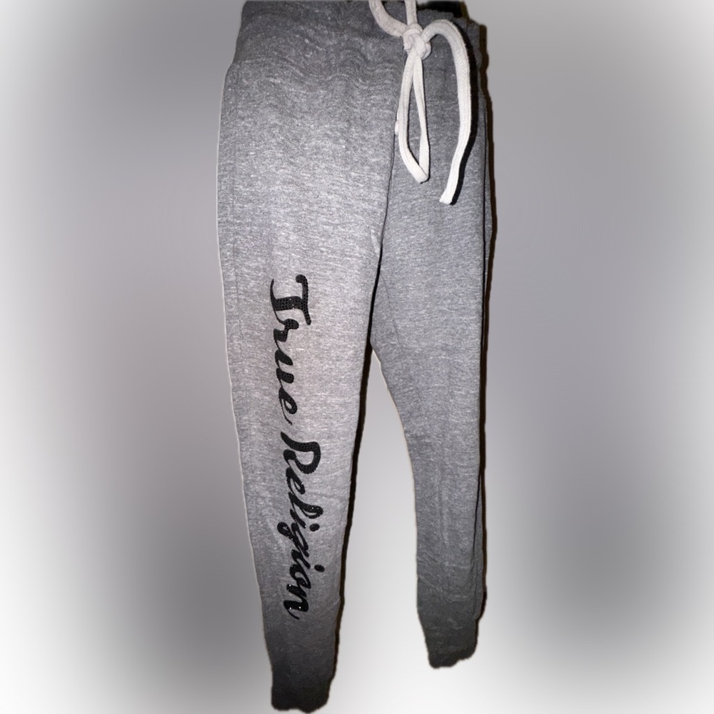Women’s True Religion stylish sweatpants with black crystals says true religion